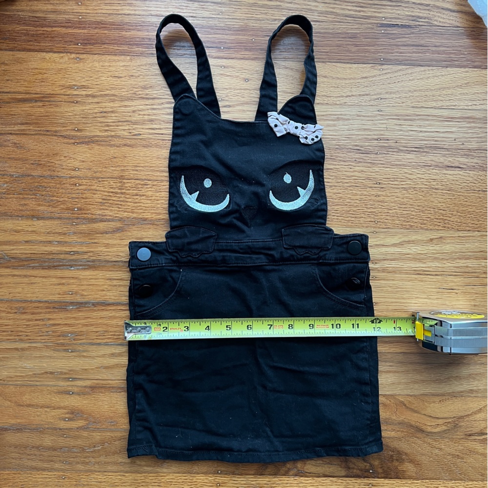 Fun black cat jumper dress with cat eyes and ears!